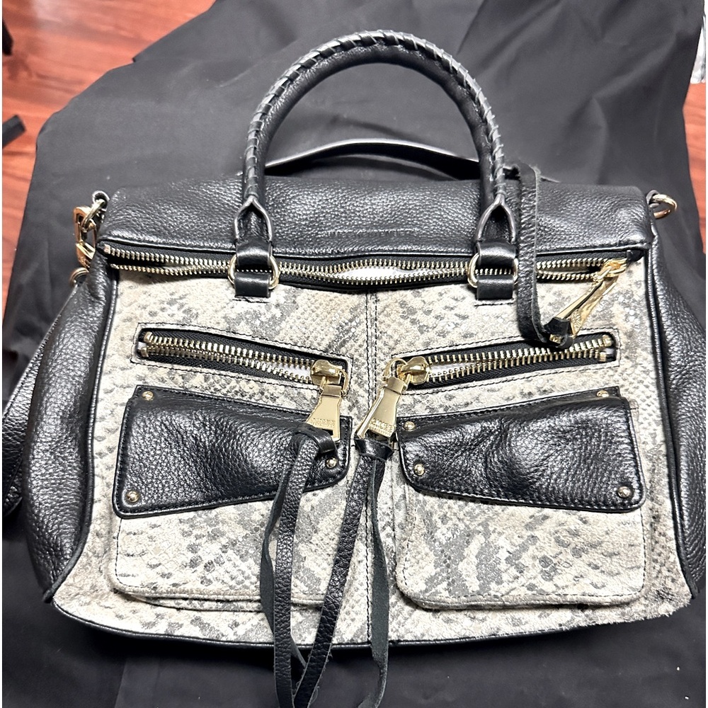 Aimee Kestenberg black and animal print.